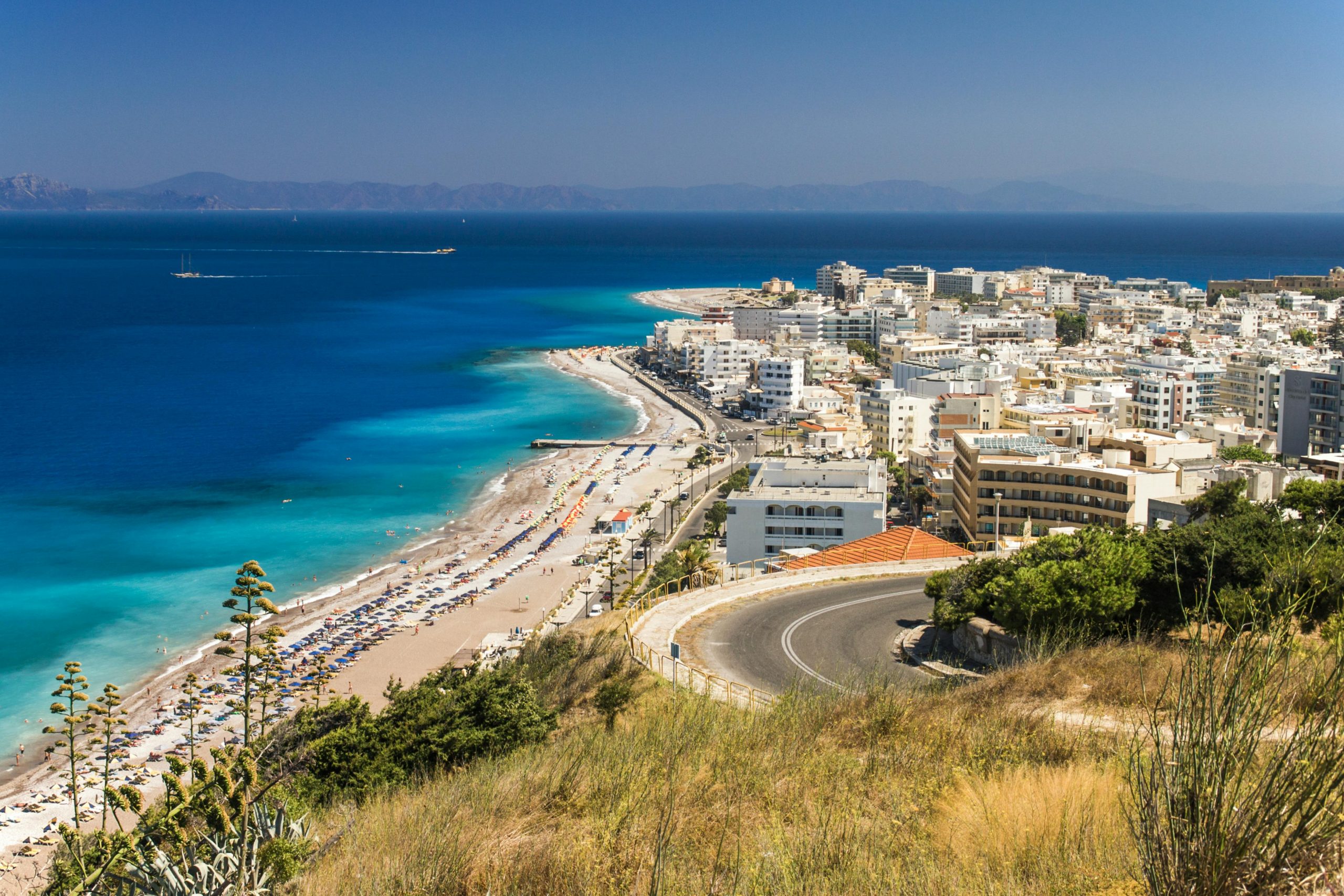 Aerial View of City Buildings Near Sea - Greek Island